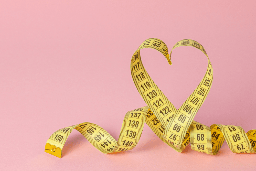 Measuring tape in heart shape to show how important case study metrics are