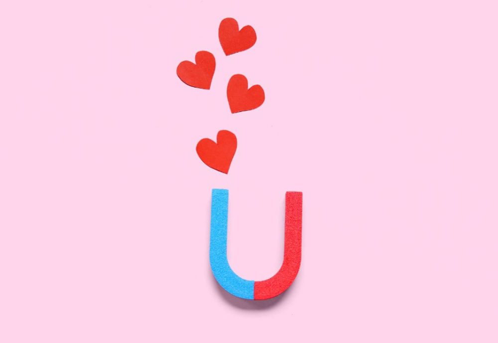 Lead magnet - picture of magnet with hearts being attracted to it